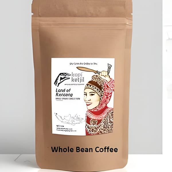 A brown bag of "Kopi Kotjil Land of Rendang" whole bean coffee with an Indonesian woman on the label.